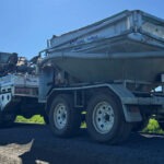 trailer to spread fertilisers with drones